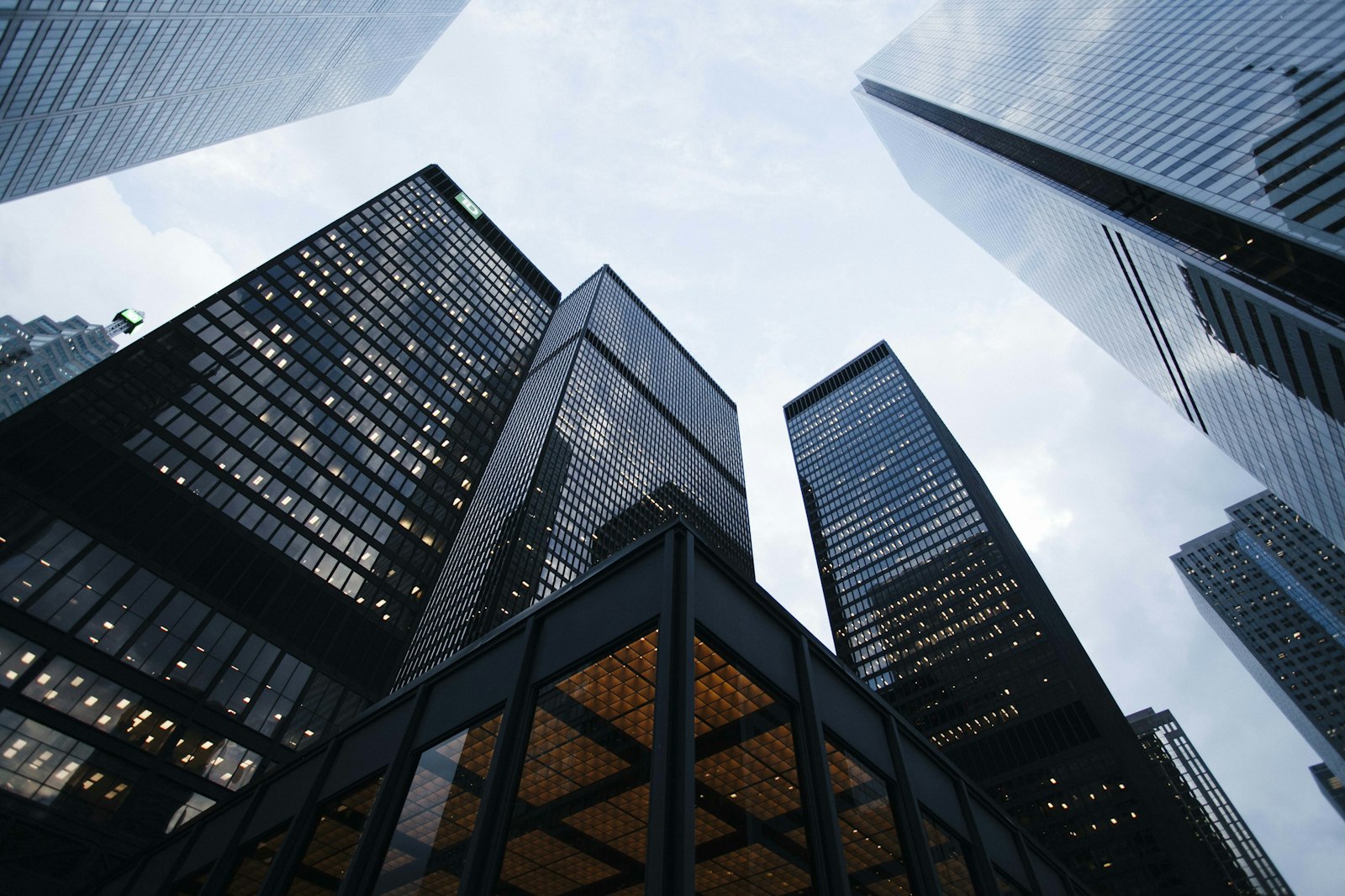 Corporate skyscraper building under clean bright blue sky